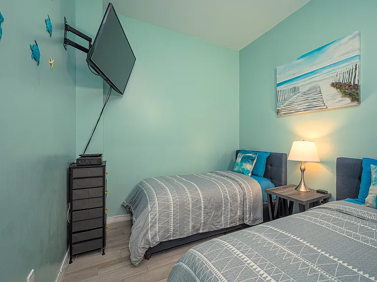Cozy 2nd Bedroom with Twin Beds and 43 inch SmartTV, including standard cable channels (note: this 2nd bedroom doesn't have any windows)