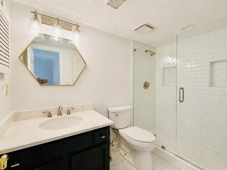 Downstairs bathroom (connects to Primary bedroom)