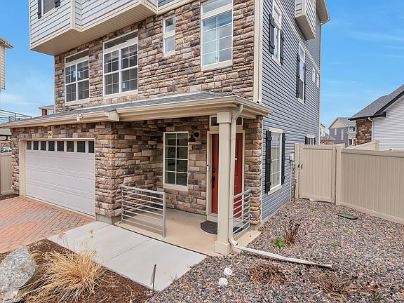 Front porch and 2 car garage!