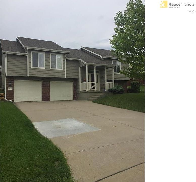 Great curb appeal with very generous driveway leading to oversized 2-car garage.
