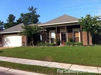 Front View
						:
						100 Summerdale Place is located on a corner lot in Farmington Station.