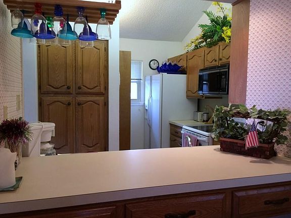 Just the right size kitchen for a getaway to the lake - complete with all appliances, including dishwasher, washer, and dryer.