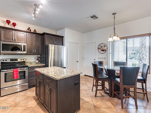 3rd image of 12224 W SURREY Street