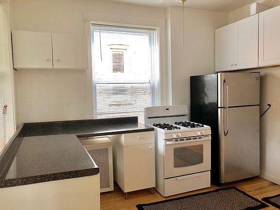 nice layout in the kitchen,trendy white and black