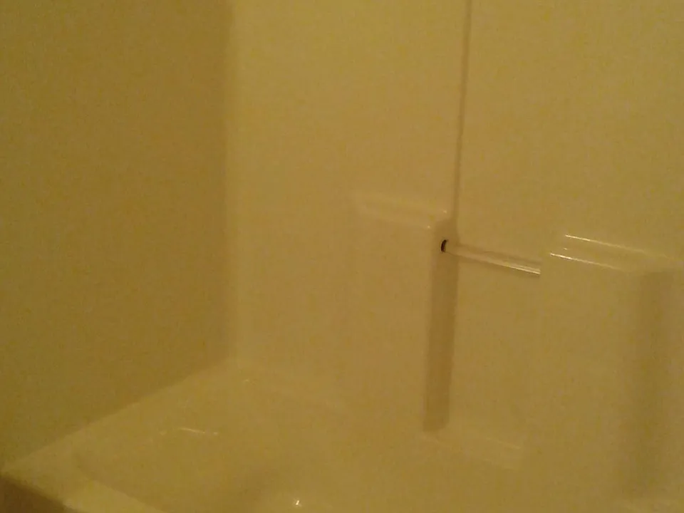 Hall bath with acrylic tub surround