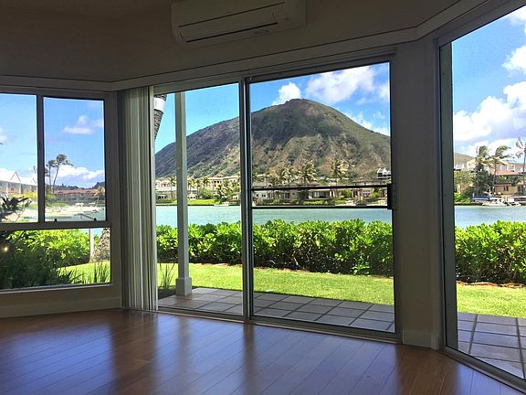 Living room view with two split A/C units.