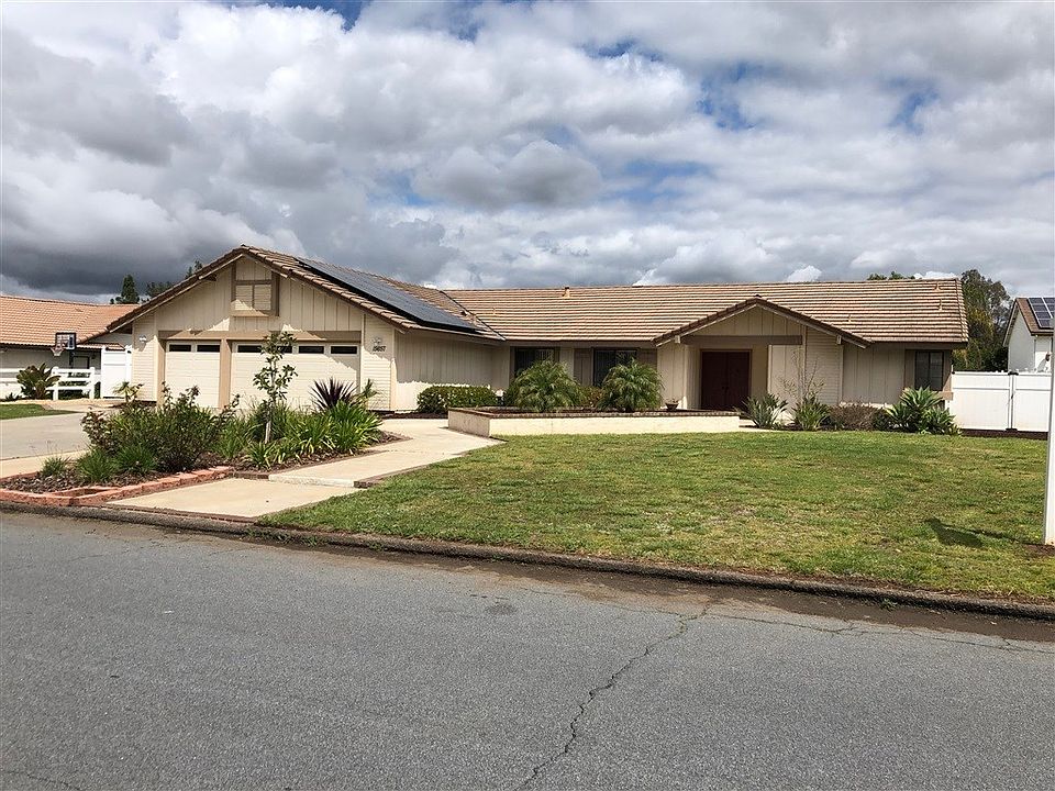 3 car garage + potential side yard access on either side of this home