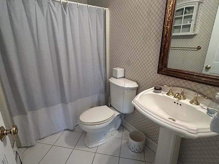 2nd full bathroom on ground floor with tub/shower combo.