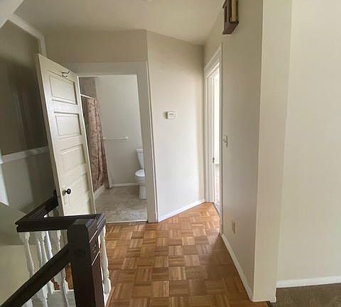 Wood flooring in hall.
