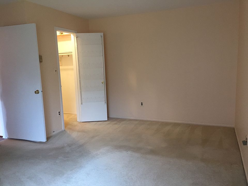 Bedroom with walk-in closet