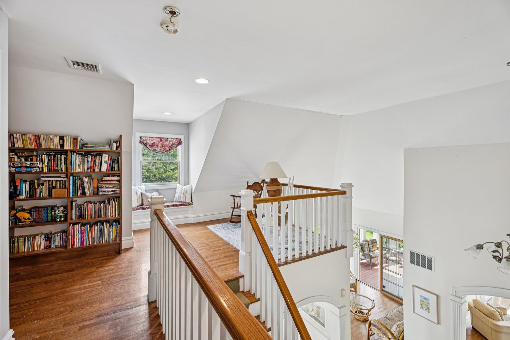 A beautifully crafted built-in library on the second level.