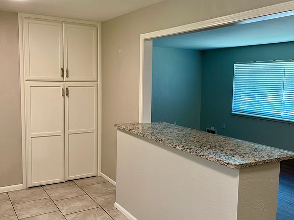 Eat up bar counter and large pantry.