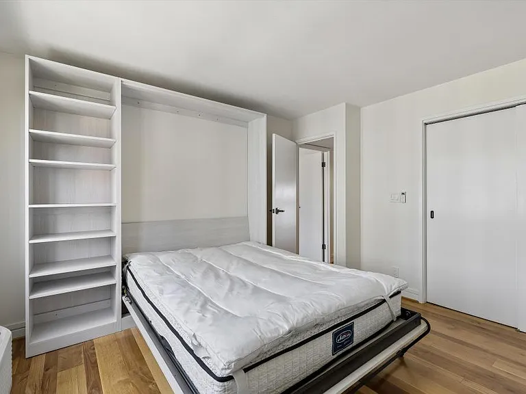 2nd bedroom unstaged with murphy bed
