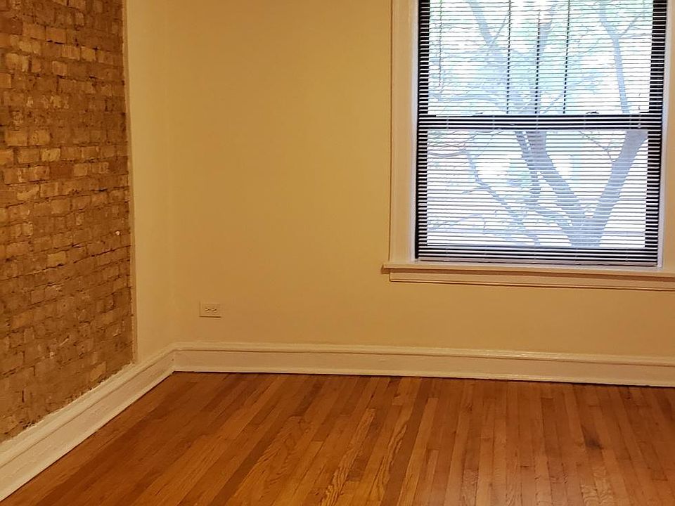 Living room with exposed brick wall