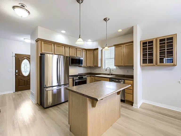 Kitchen w Stainless Appliances less than 1 year old.