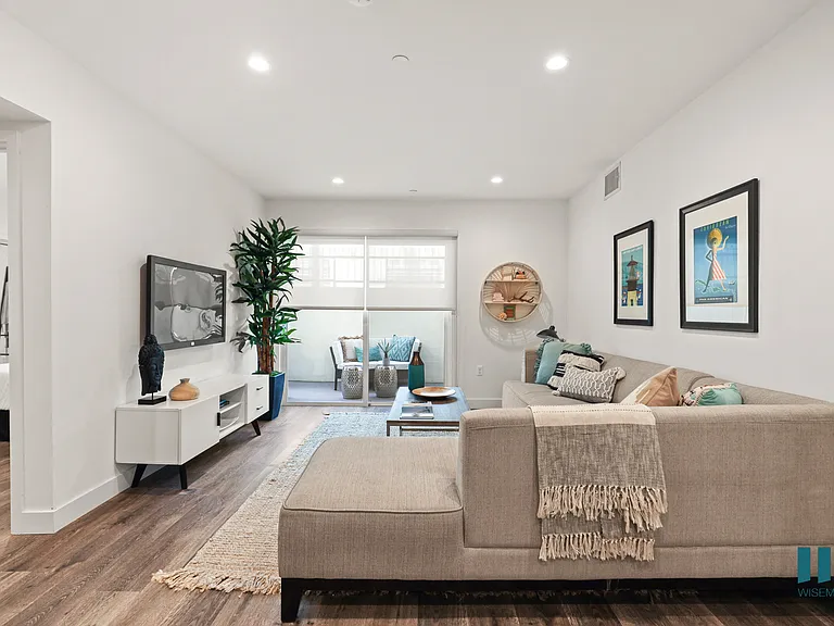 Living Room with Recessed Lighting, Vinyl Flooring, and Patio