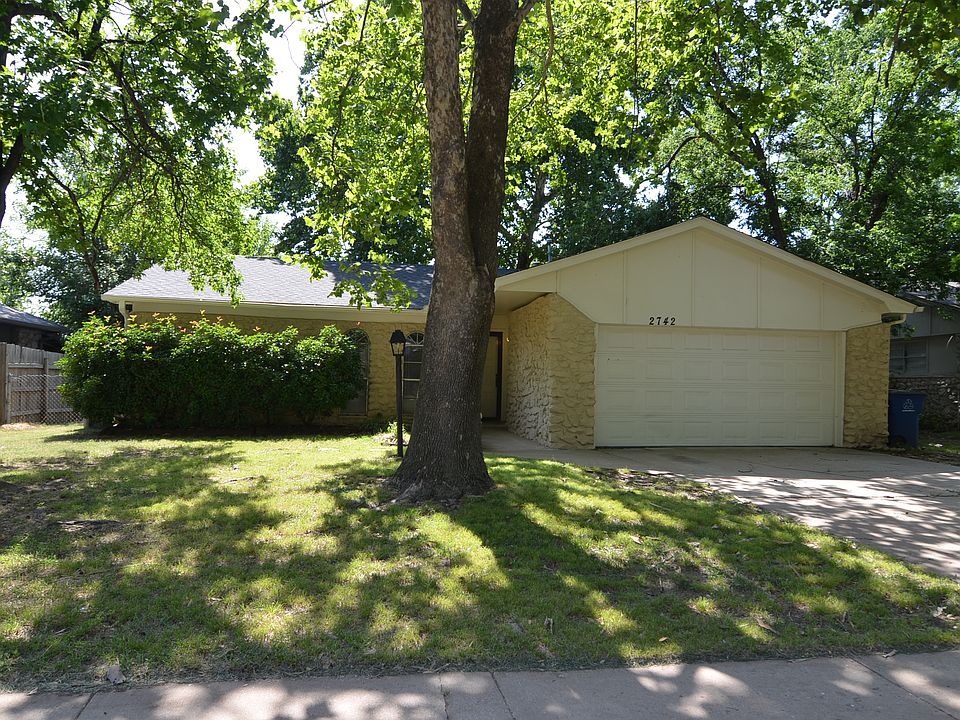 Beautiful home with mature trees