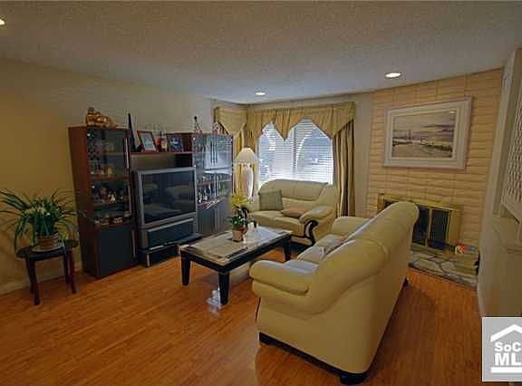 Formal living room w/ fireplace