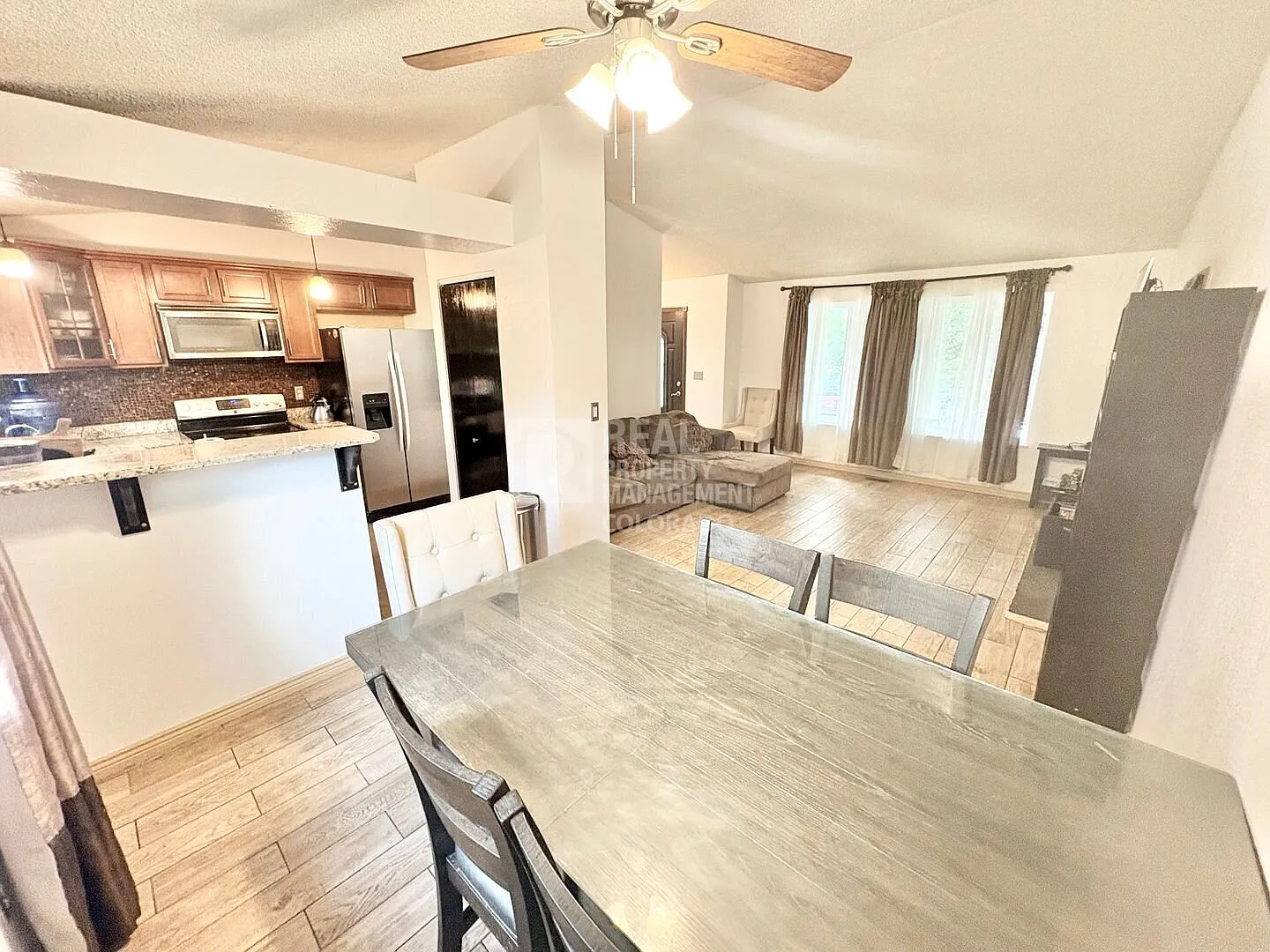 Updated 4-Bedroom Home with Finished Basement & 2-Car Garage — Photo 4