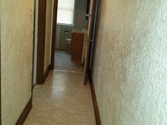 Hall Leading To Kitchen And Bath