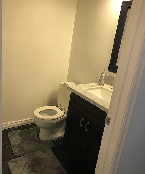Half bath downstairs .