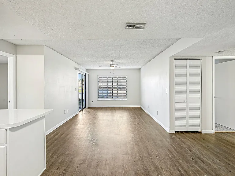 Flamingo Executive Living Area with oak planking white walls