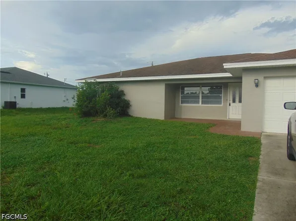119 Riviera St, Lehigh Acres, FL 33936