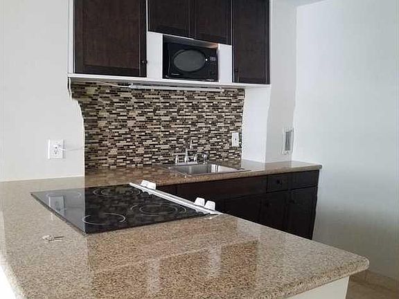 3rd image of 9440 W Bay Harbor Dr APT 3B