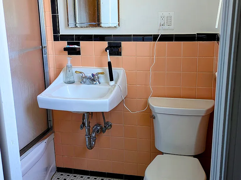 Bathroom - with medicine cabinet and shower stall/bathtub