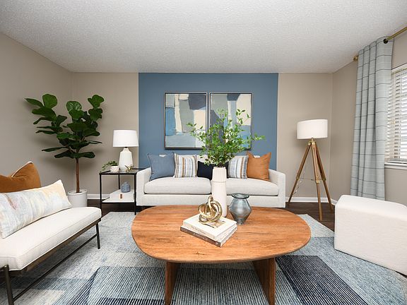 Spacious living room with hardwood-style flooring