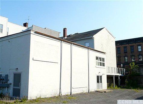 Rear double story gallery addition with two level access.