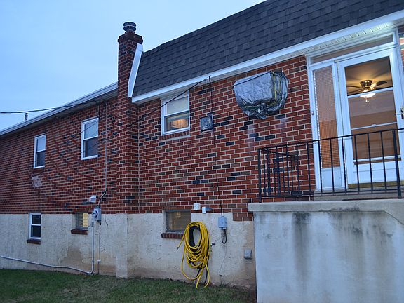 Side view of the house with new roof