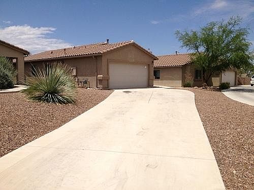 house has VERY long driveway]