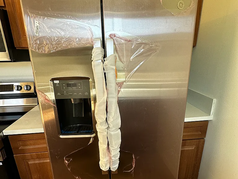Refrigerator Prior to Unwrapping