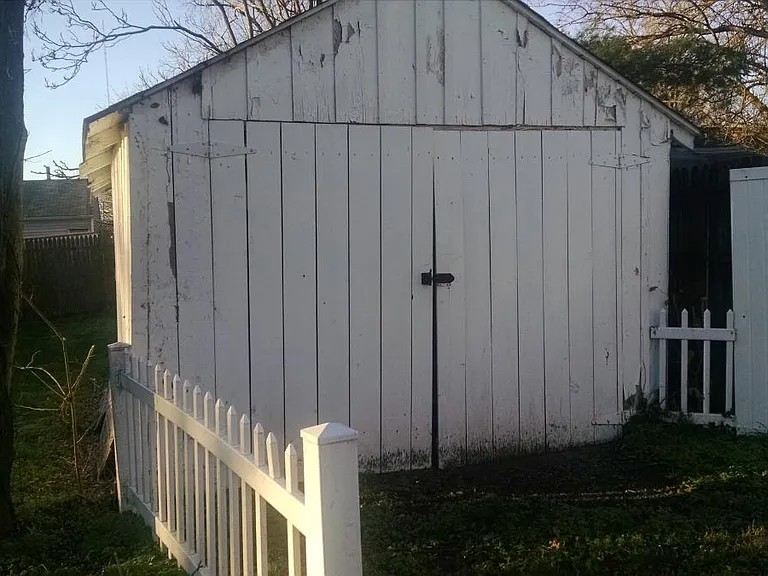 Privacy fencing on most of the yard. The yard is open to the driveway.