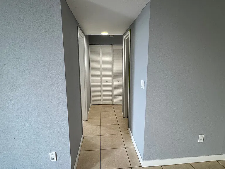 Hallway shelved linen closet