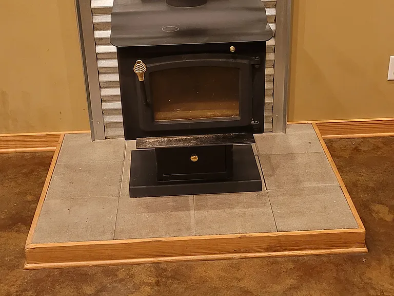 The living room fireplace adds coziness to your winter nights, and can keep the house heated if there is a power outage.