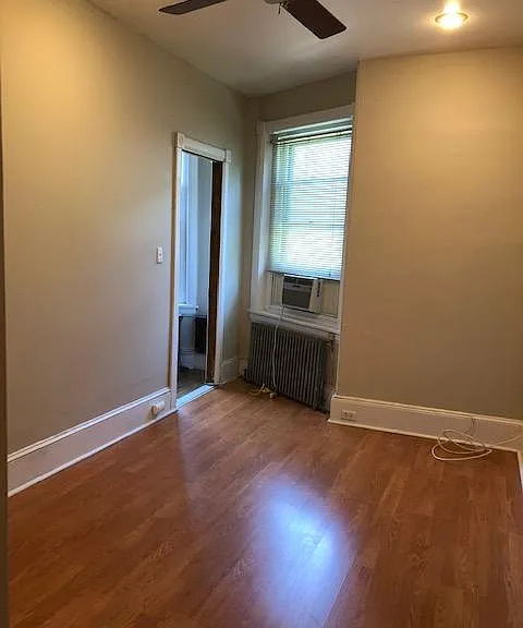 Bedroom showing door to living room