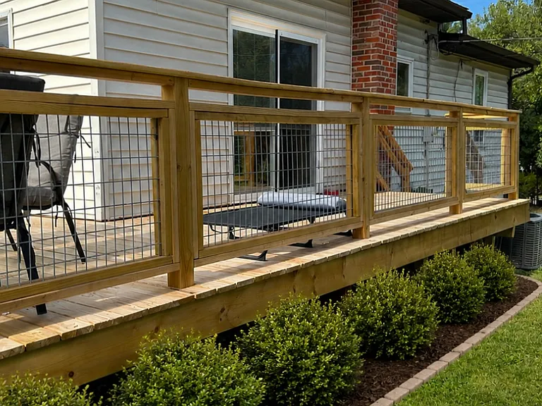 New deck in the back of the yard/house.