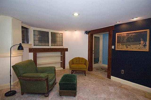Looking at front of apartment and the front entrance. There is a closet on the other side of the front door.