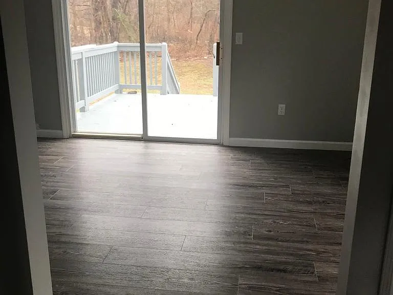 Updated paint, sound proofing and luxury vinyl planking floors.