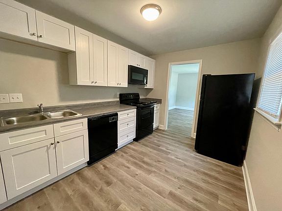 All new kitchen includes range, refrigerator, dishwasher and microwave