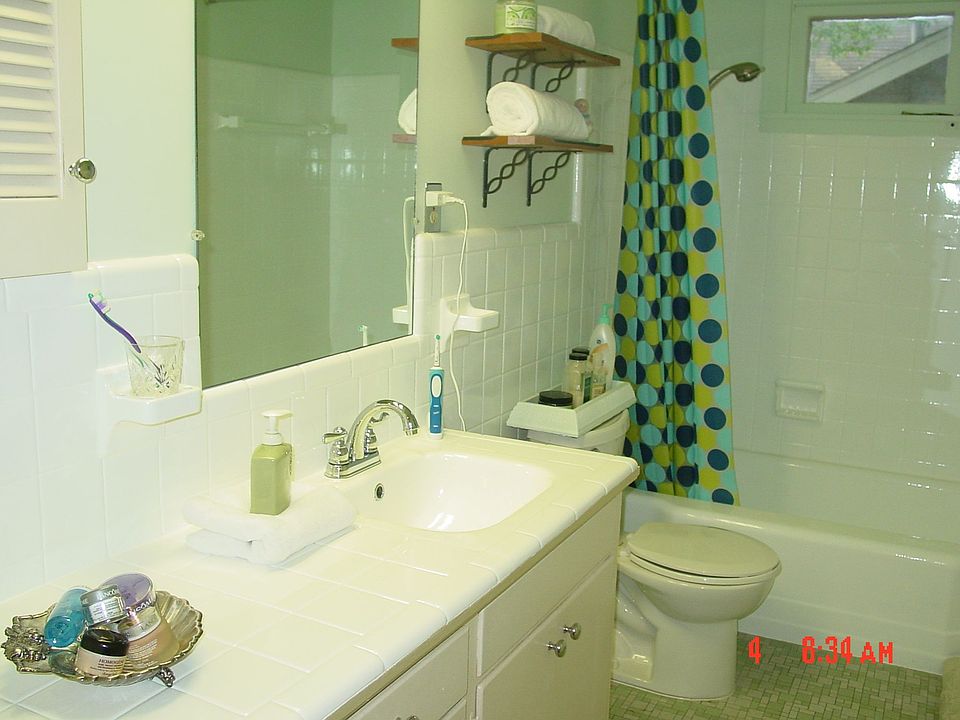 Newly resurfaced bathroom - stunning white tub and tile