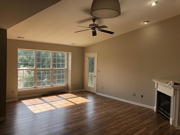 Main Living Area; Brand new lighting, flooring and fireplace!