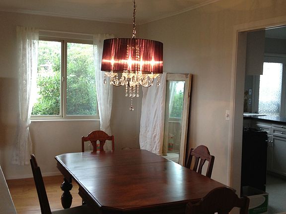 Dining room w/ built-in cupboards