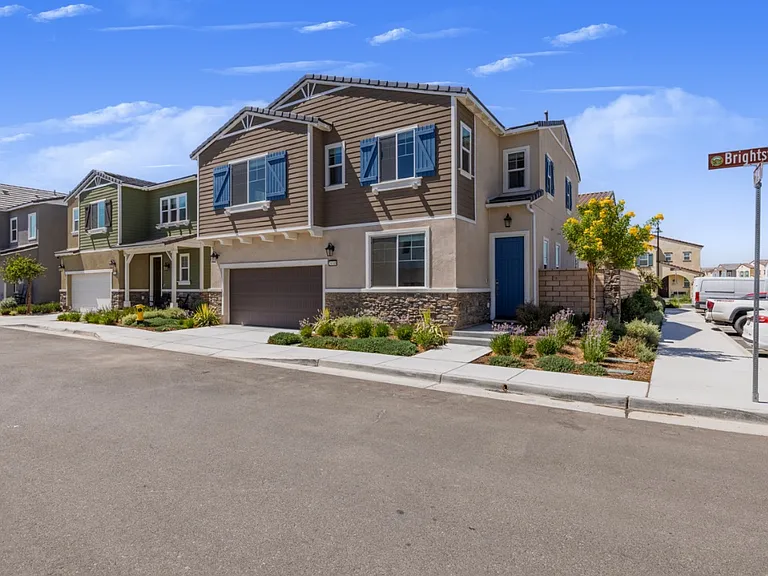 Beautiful corner-lot home in North Menifee's "The Village" community featuring modern architecture, landscaped front yard, and a two-car garage. Prime location offering privacy, great curb appeal, and easy access to main streets.