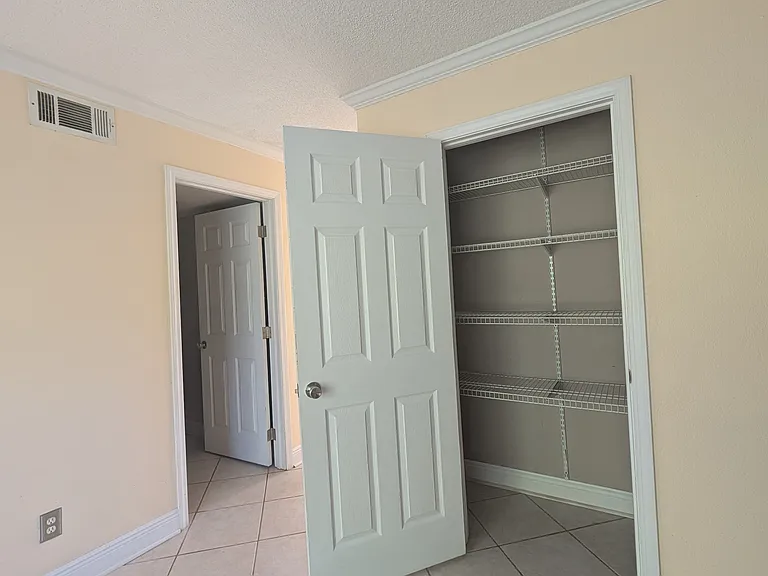 Kitchen facing pantry and laundry room