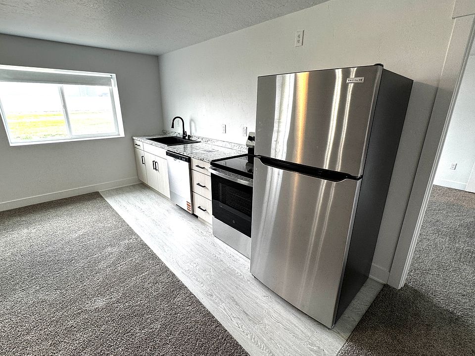 Brand new kitchen appliances with above range microwave being installed before move in.
