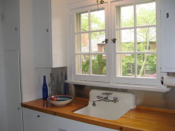 Charming kitchen with original sink and wooden countertop
