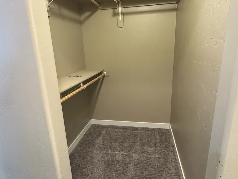 Master Closet 1, walk in. 1 of 2 master closets